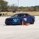 The Boostang at full suspension lean, flat out on course...